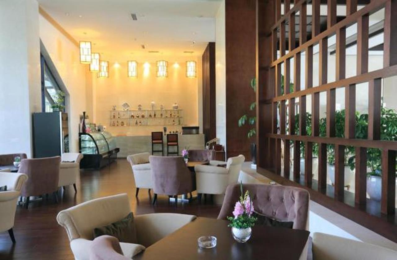Отель Ramada Suzhou Luzhi Экстерьер фото
